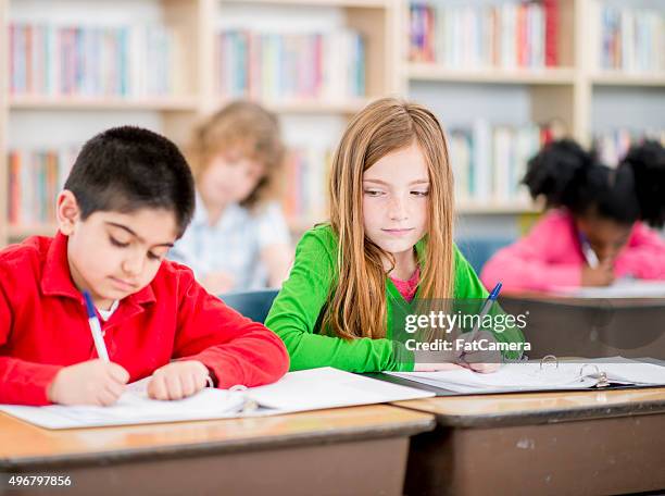 130 Child Cheating On Test Stock Photos, High-Res Pictures, and Images ...