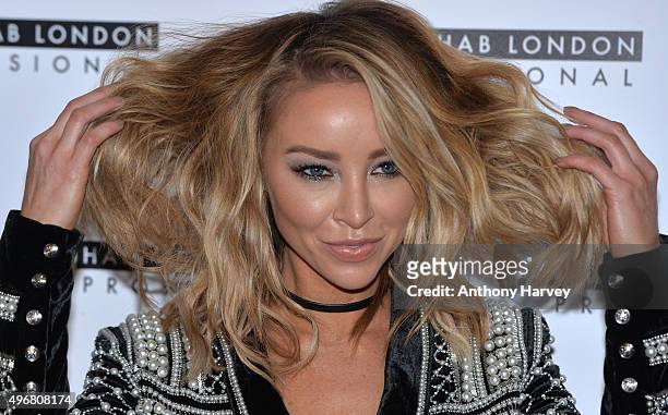 Lauren Pope attends a photocall to launch her Academy for Hair Rehab London at Sanctum Soho on November 12, 2015 in London, England.