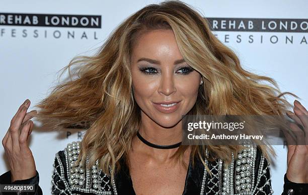 Lauren Pope attends a photocall to launch her Academy for Hair Rehab London at Sanctum Soho on November 12, 2015 in London, England.