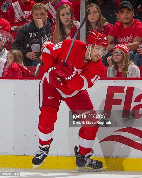Joakim Andersson of the Detroit Red Wings passes the puck during an NHL game against the Dallas Stars at Joe Louis Arena on November 8, 2015 in...
