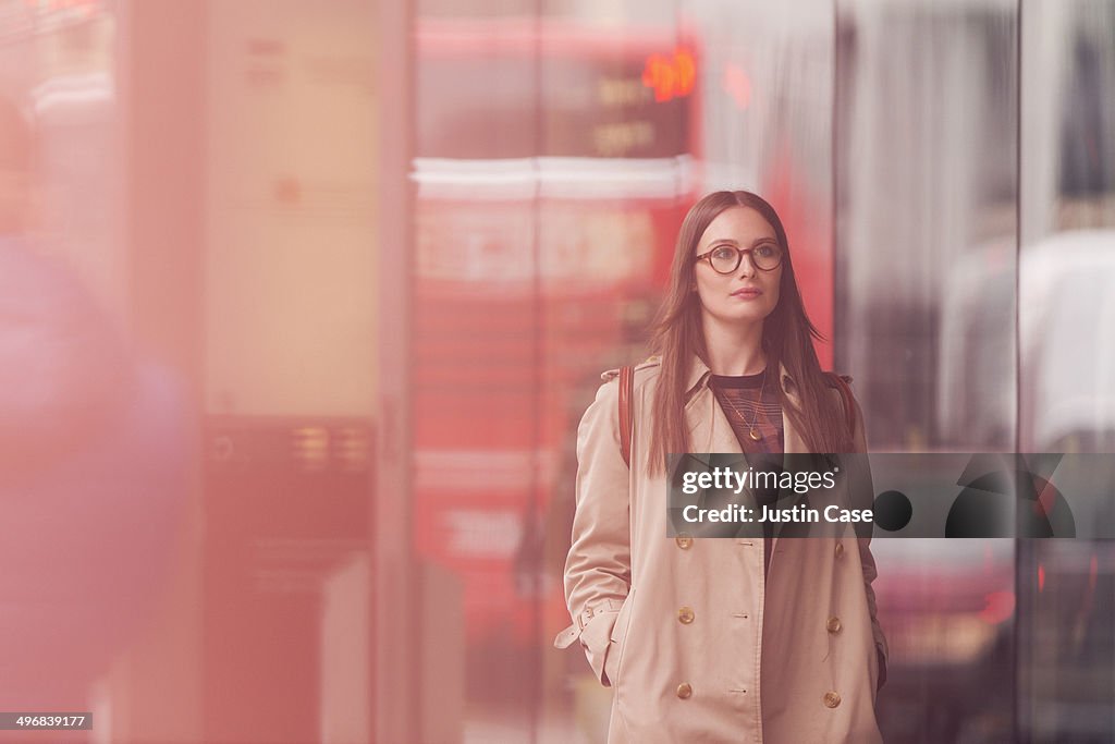 Classy woman walking in a big city street