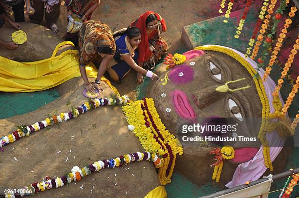 People perform rituals during Govardhan Puja also called Annakut at the ISKCON temple at Raj Nagar on November 12, 2015 in Ghaziabad, India....