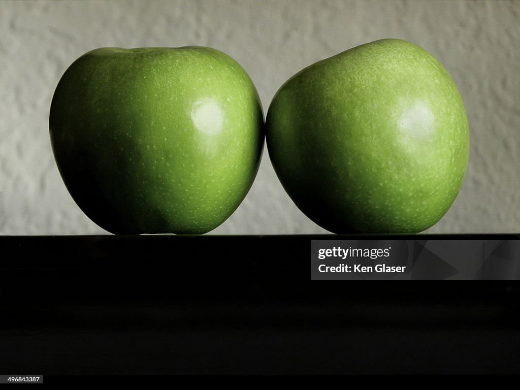 Two apples in Close contact