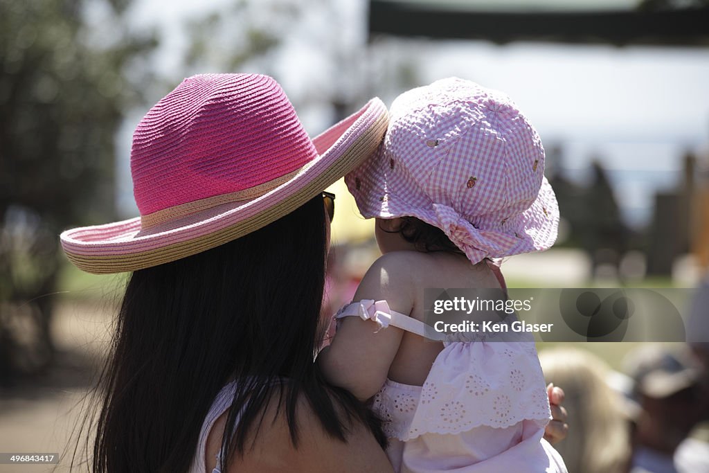 Child in Mothers Arms at  Concert