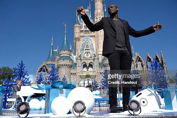 In this handout provided by Disney Parks, Seal performs during the taping of the 'Disney Parks Unforgettable Christmas Celebration' TV special in...