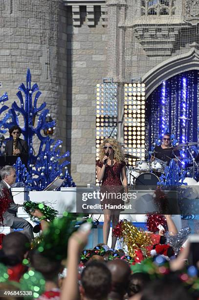 In this handout provided by Disney Parks, Tori Kelly performs during the taping of the 'Disney Parks Unforgettable Christmas Celebration' TV special...