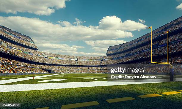 soleado estadio de fútbol americano - soccer pitch fotografías e imágenes de stock