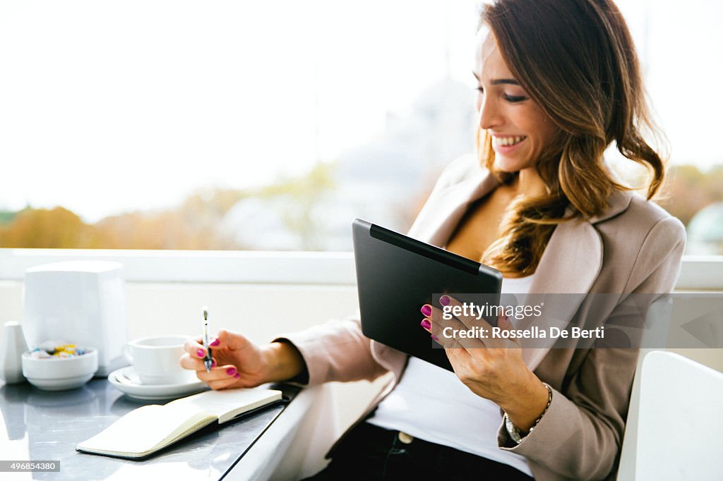 Portrait Of Successful Businesswoman Working At Cafè