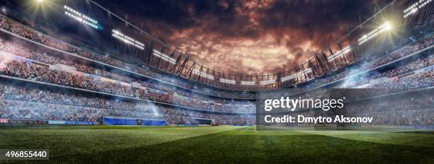 dramatic soccer stadium - digital audience stock pictures, royalty-free photos & images