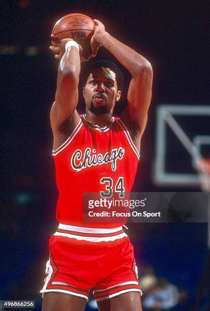 David Greenwood of the Chicago Bulls shoots a free throw against the Washington Bullets during an NBA basketball game circa 1983 at the Capital...