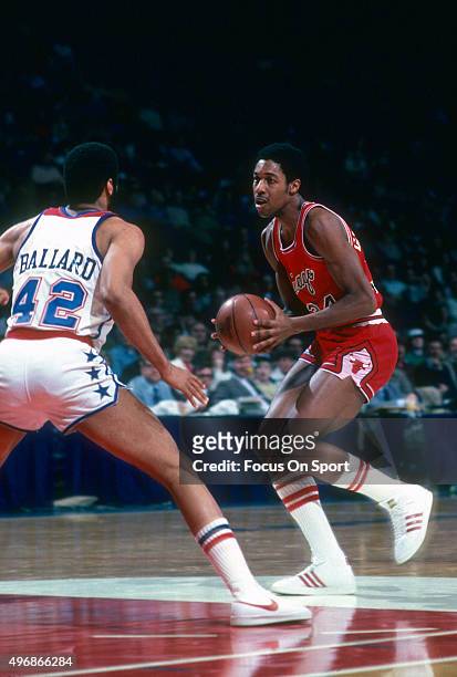 David Greenwood of the Chicago Bulls looks to put a move on Greg Ballard of the Washington Bullets during an NBA basketball game circa 1985 at the...