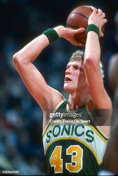 Jack Sikma of the Seattle Supersonics shoots a free throw against the Washington Bullets during an NBA basketball game circa 1982 at the Capital...