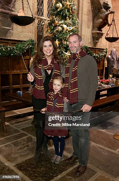 Amanda Lamb, Sean McGuinness and daughter Willow attend the Launch Of Hogwarts In The Snow at Warner Bros. Studio Tour London on November 12, 2015 in...