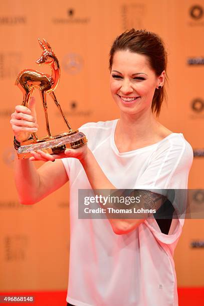Christina Stuermer is seen with her award at the Bambi Awards 2015 winners board at Stage Theater on November 12, 2015 in Berlin, Germany.