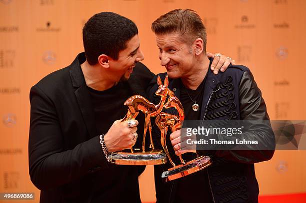 Andreas Bourani and Hartmut Engler are seen with their awards at the Bambi Awards 2015 winners board at Stage Theater on November 12, 2015 in Berlin,...