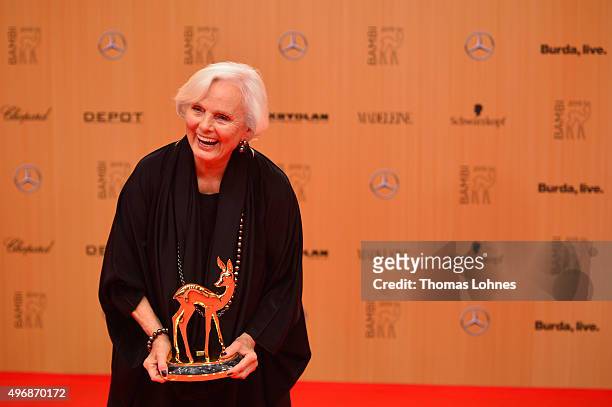 Actress Ruth Maria Kubitschek is posing with the award she accepted on behalf of producer Wolfgang Rademann at the Bambi Awards 2015 winners board at...