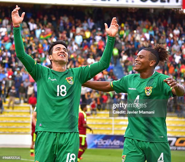 Rodrigo Ramallo of Bolivia celebrates with teammate Leonel Morales after scoring the third goal of his team during a match between Bolivia and...