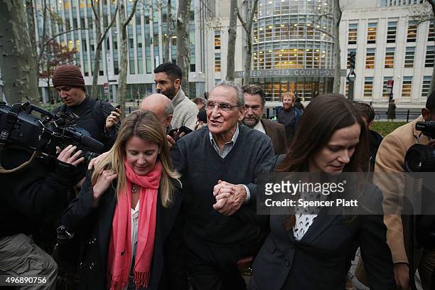 Alleged Bonanno crime family captain Vincent Asaro walks with his lawyers outside of a Brooklyn court house after a jury found him not guilty of one...