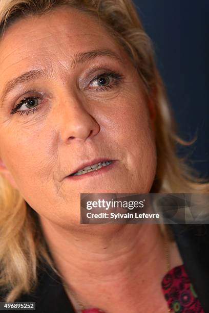 French Far-Right National Front President Marine Le Pen talks with journalists during the press conference about the collective Audace on November...