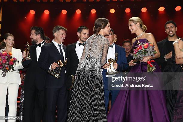 Yvonne Catterfeld, Sebastian Krumbiegel, Tobias Moretti, Clemens Schick, Hilary Swank, Otto Waalkes, Heidi Klum and Andreas Bourani on stage after...