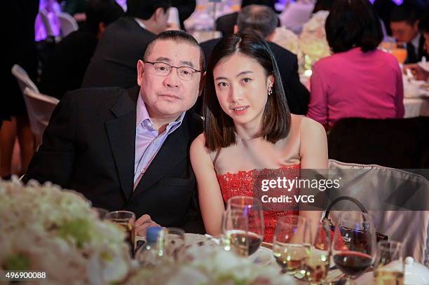 Hong Kong billionaire Joseph Lau Luen Hung and his girlfriend Chan Hoi-wan attend the wedding ceremony of Irene Wang and Karson Choi on November 30,...