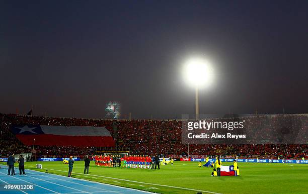 Players of Chile sing their national anthem prior a match between Chile and Colombia as part of FIFA 2018 World Cup Qualifiers at Nacional Stadium on...
