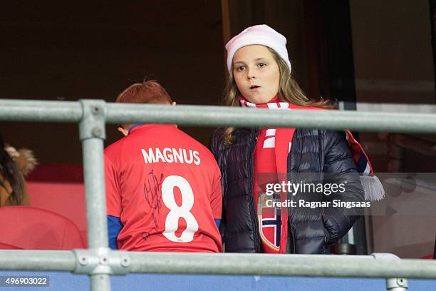 Prince Sverre Magnus of Norway and Princess Ingrid Alexandra of Norway attend the Play Off Game Between Norway and Hungary on November 12, 2015 in...