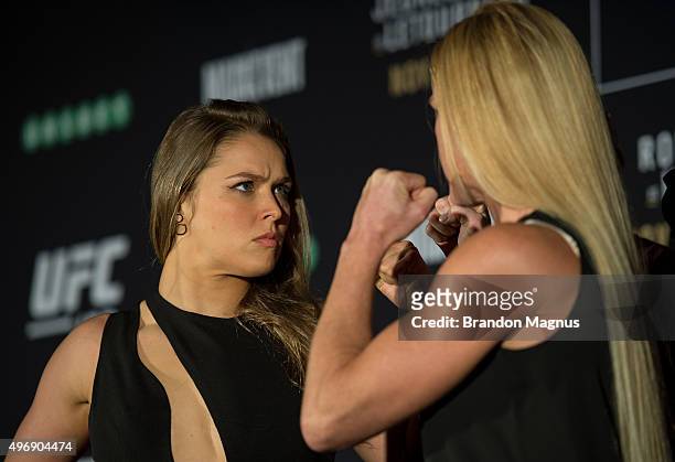 Women's bantamweight champion Ronda Rousey of the United States and Holly Holm of the United States face off during the UFC 193 Ultimate Media Day...
