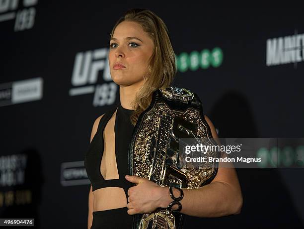 Women's bantamweight champion Ronda Rousey of the United States poses for photos during the UFC 193 Ultimate Media Day festivities at Etihad Stadium...