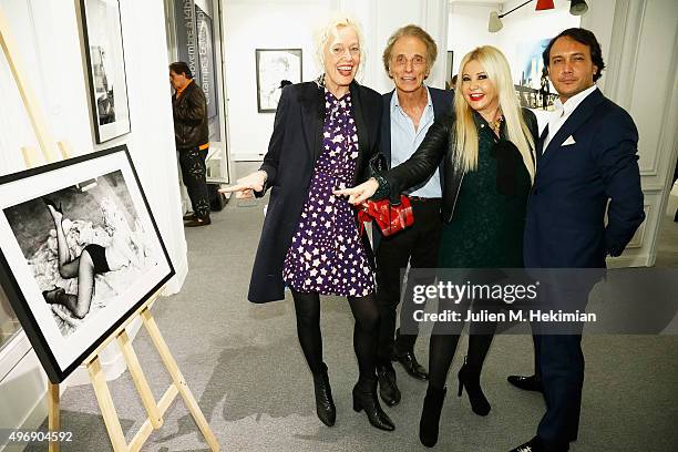 Ellen Von Unwerth, Eric Colmet Daage, Monika Bacardi and David Swaelens-Kane attend the New Photo Department celebration at the Auction House...