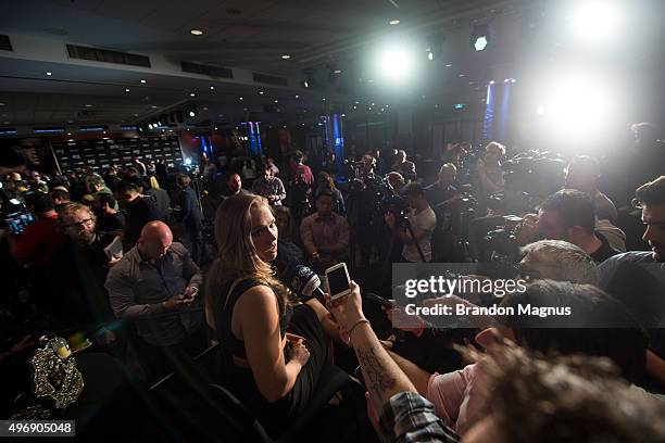 Women's bantamweight champion Ronda Rousey of the United States speaks to the media during the UFC 193 Ultimate Media Day festivities at Etihad...