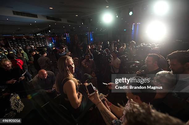 Women's bantamweight champion Ronda Rousey of the United States speaks to the media during the UFC 193 Ultimate Media Day festivities at Etihad...