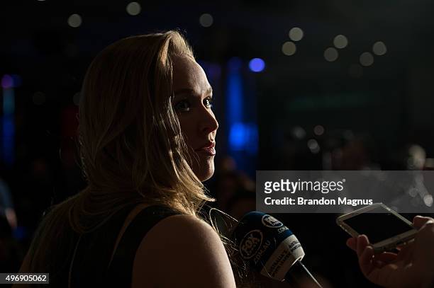 Women's bantamweight champion Ronda Rousey of the United States speaks to the media during the UFC 193 Ultimate Media Day festivities at Etihad...