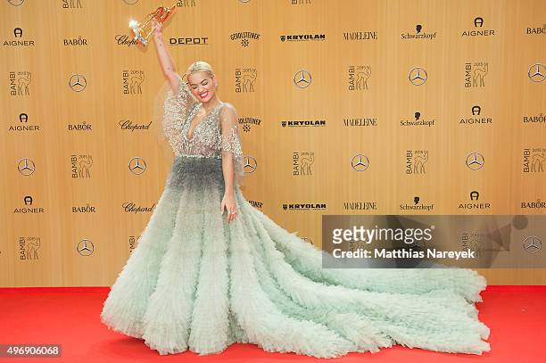 Rita Ora poses at the Bambi Awards 2015 winners board at Stage Theater on November 12, 2015 in Berlin, Germany.