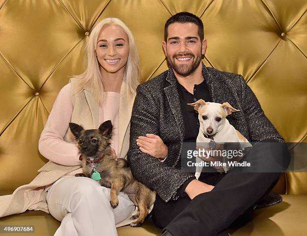 Hollywood couple Jesse Metcalfe, Cara Santana and their pups Shepherd and Dexter pose for the first 'Pet Portrait with Santa' of the season at the...