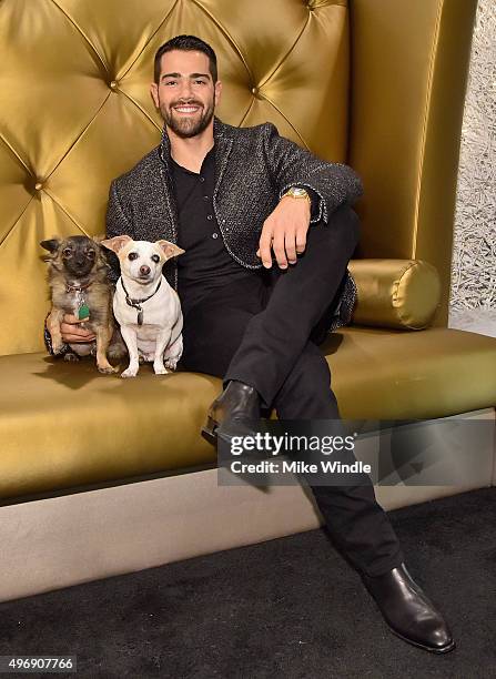 Hollywood couple Jesse Metcalfe, Cara Santana and their pups Shepherd and Dexter pose for the first 'Pet Portrait with Santa' of the season at the...