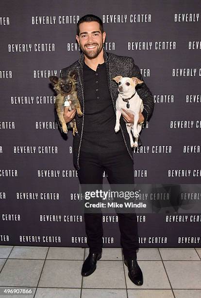 Hollywood couple Jesse Metcalfe, Cara Santana and their pups Shepherd and Dexter pose for the first 'Pet Portrait with Santa' of the season at the...