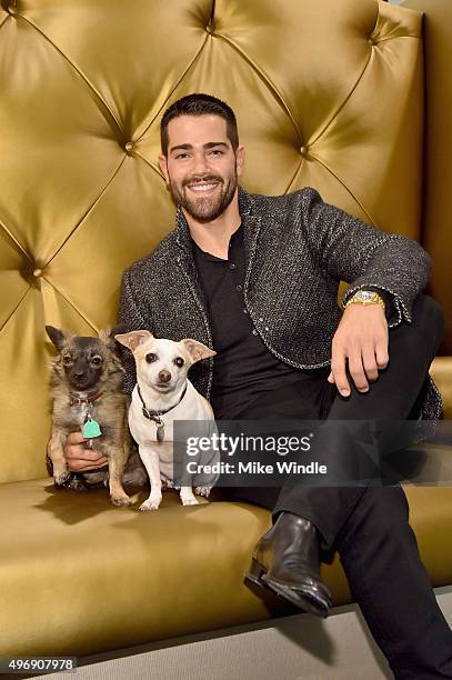 Hollywood couple Jesse Metcalfe, Cara Santana and their pups Shepherd and Dexter pose for the first 'Pet Portrait with Santa' of the season at the...