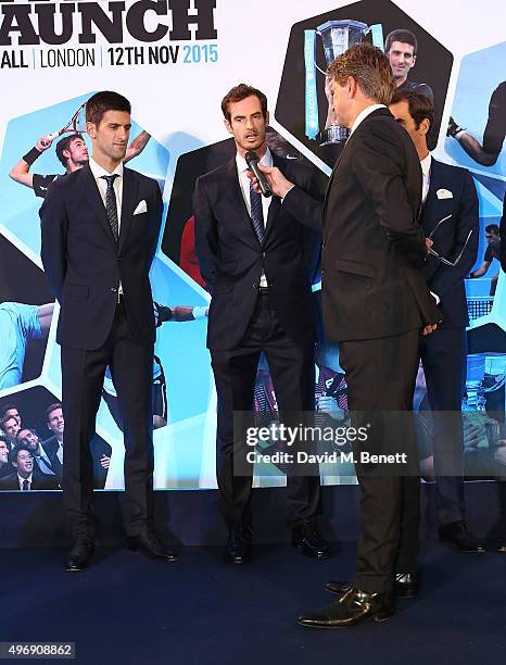 Novak Djokovic, Andy Murray, Andrew Castle and Roger Federer celebrate with Moet & Chandon and raise a toast to the official launch of the 2015...