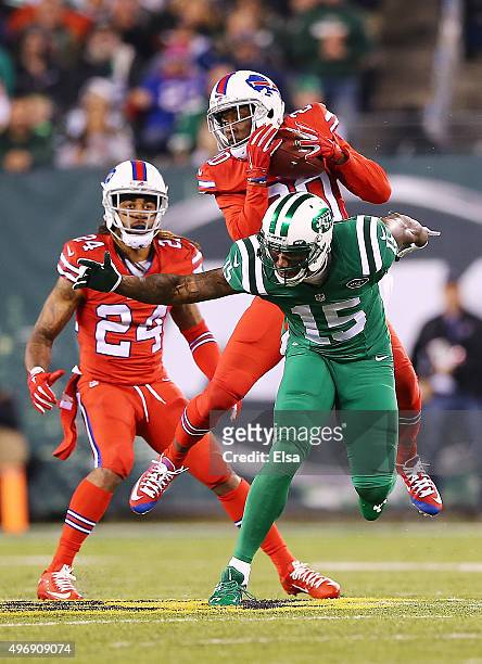 Corey Graham of the Buffalo Bills intercepts a pass intended for Brandon Marshall of the New York Jets during the second quarter at MetLife Stadium...