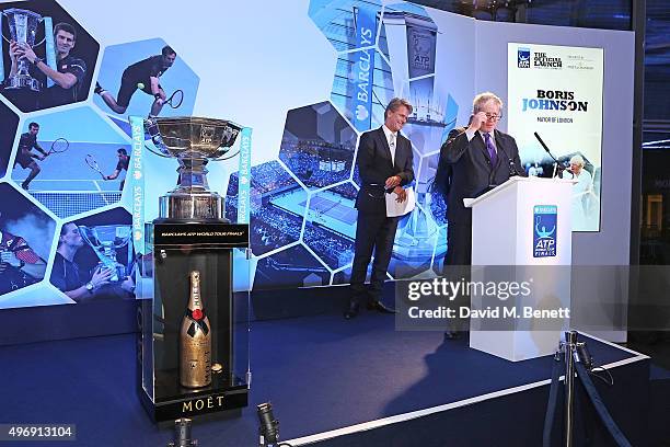 Andrew Castle and Boris Johnson celebrate with Moet & Chandon and raise a toast to the official launch of the 2015 Barclays ATP World Tour Finals at...