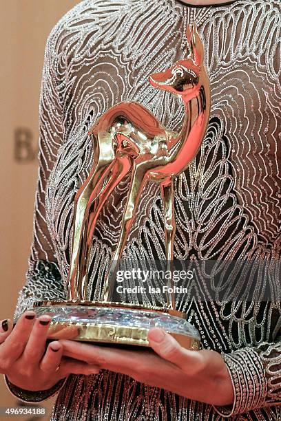 The Bambi in the hand of Hilary Swank at the Kryolan At Bambi Awards 2015 - Red Carpet Arrivals on November 12, 2015 in Berlin, Germany.
