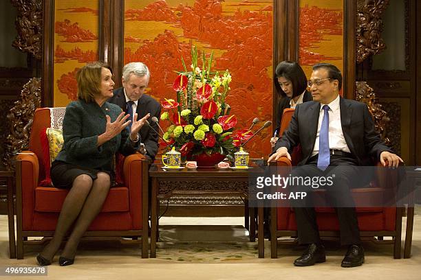 House Minority Leader Nancy Pelosi of California speaks with Chinese Premier Li Keqiang during a bilateral meeting at the Zhongnanhai leadership...