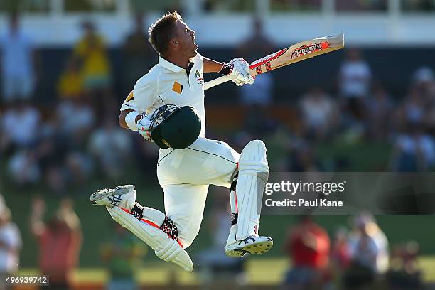 David Warner of Australia celebrates after scoring his double century during day one of the second Test match between Australia and New Zealand at...