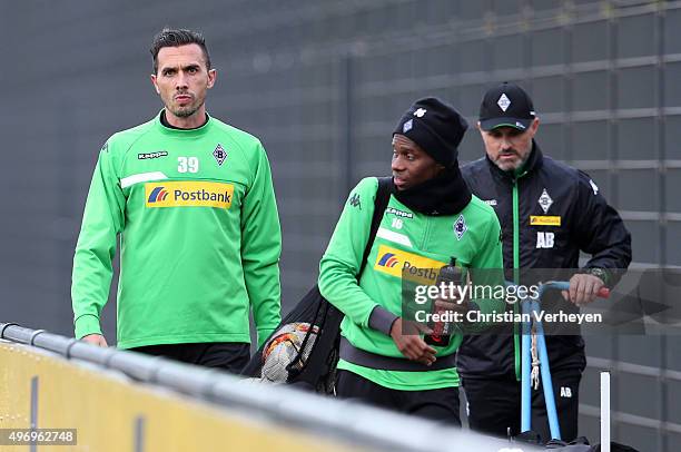 Martin Stranzl and Ibrahima Traore of Borussia Moenchengladbach after a training session at Borussia-Park on November 13, 2015 in Moenchengladbach,...