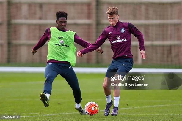 Ola Aina and Solly March in action during England U21 Training at the American Express Elite Football Performance Centre on November 13, 2015 in...