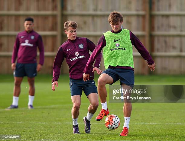 John Swift and Solly March in action during England U21 Training at the American Express Elite Football Performance Centre on November 13, 2015 in...