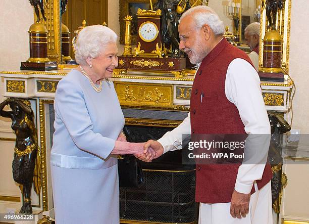 Queen Elizabeth II meets Indian Prime Minister Narendra Modi at Buckingham Palace on the second day of his visit to the UK on November 13 in London,...