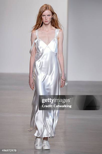 Wearing the latest slip lingerie trend, a model walks the Calvin Klein fashion show runway at the spring summer 2016 women's ready-to-wear fashion...