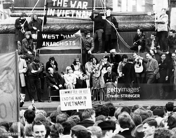 Folk singer Joan Baez performs for a free concert against the war in Vietnam, on May 29, 1965 during an anti-Vietnam War demonstration in London's...